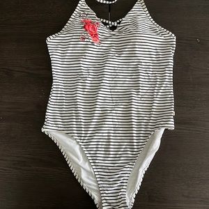 Blue and white striped halter bathing suit with floral embroidery detailing